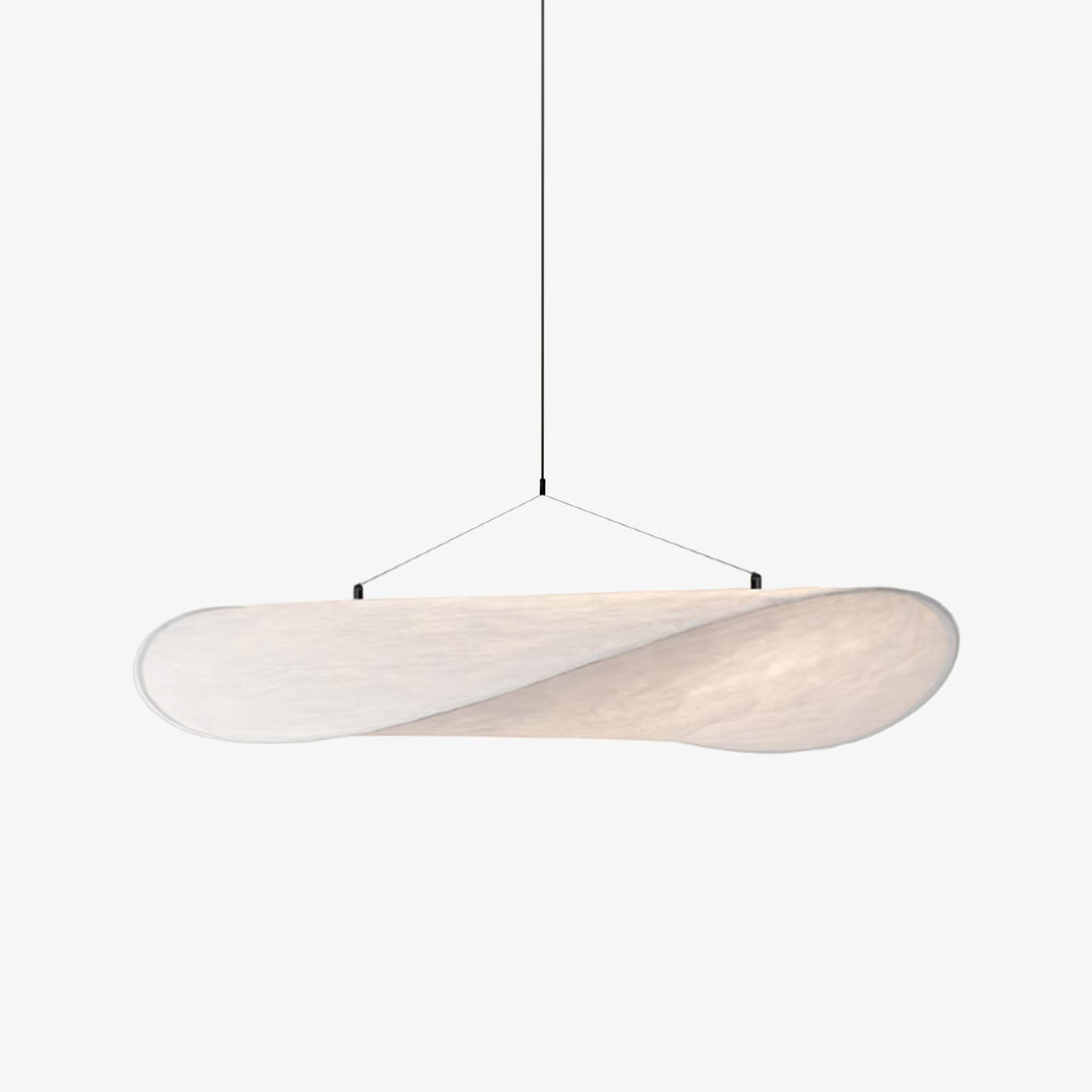 Tense white silk pendant light above a dining table