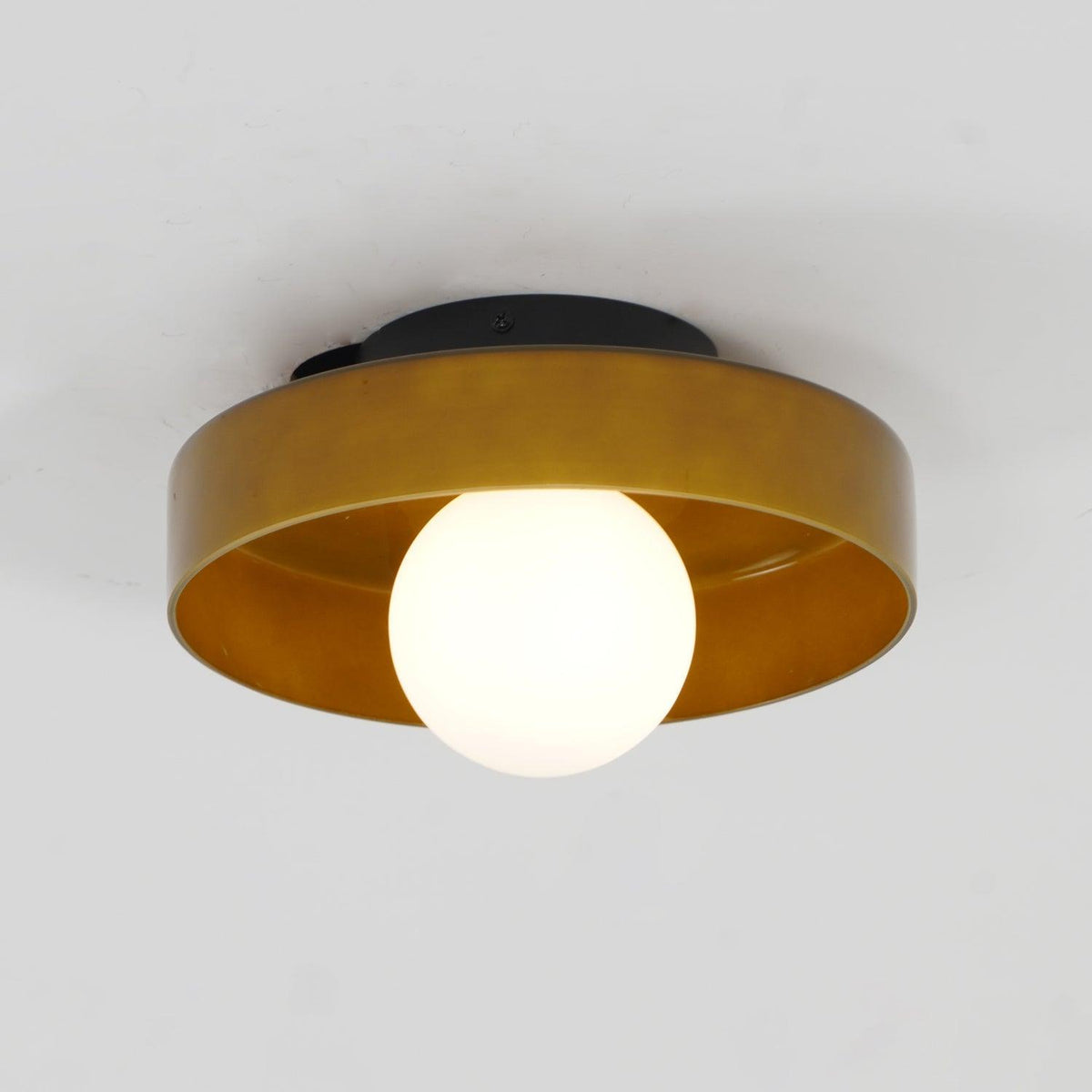Orla glass flush mount ceiling light in an interior